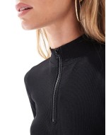 ribbed high neck half zip long sve bodysuit in black