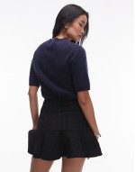 mini skirt with fluted hem in black pane check