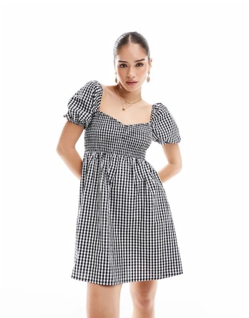 Exclusive mini puff sve beach dress in black and white gingham