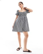 Exclusive mini puff sve beach dress in black and white gingham